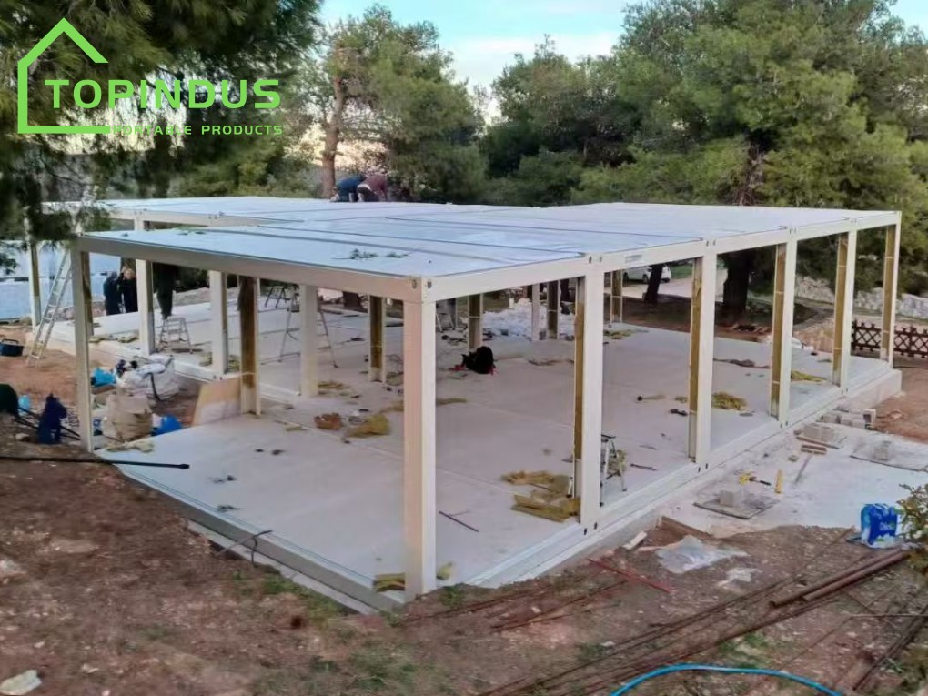 ग्रीस में टॉपइंडस फ्लैट पैक कंटेनर हाउस की चर्च अनुकूलन परियोजना